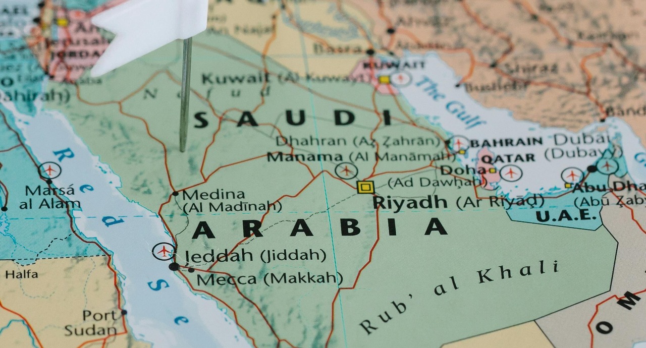 Map of the Middle East highlighting Saudi Arabia, the UAE, and surrounding countries with a pin marking a location.